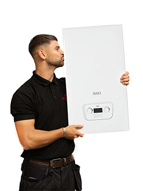 Gas engineer kissing his boiler